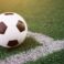soccer ball on the white line at stadium