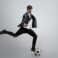 Dream about the biggest win in life. Man in office clothes traines in football or soccer with ball on grey background. Unusual look for businessman in motion, action. Sport, healthy lifestyle.